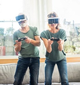 Photo of people using VR gaming headsets